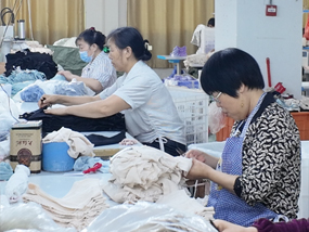 In-line QC checks for functional underwear performance.