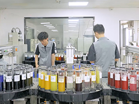 Mixing non-toxic, eco-friendly dyes for skin-safe fabrics.