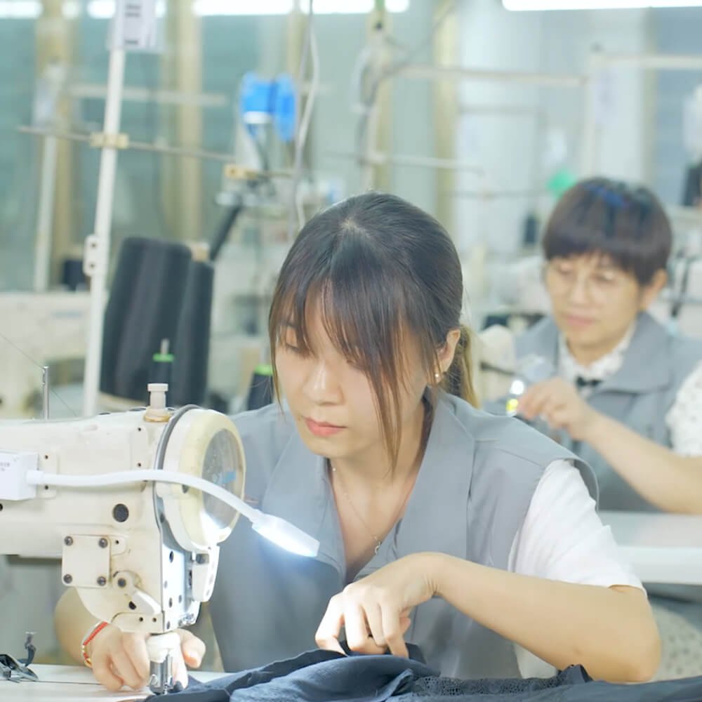 Precision sewing and multi-layer gusset assembly of functional leakproof briefs at Lynmiss Factory